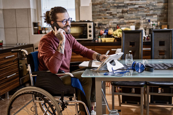 Man in Wheelchair Working
